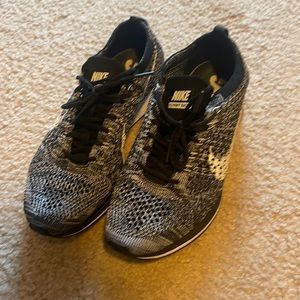Black and white fly knit racers
